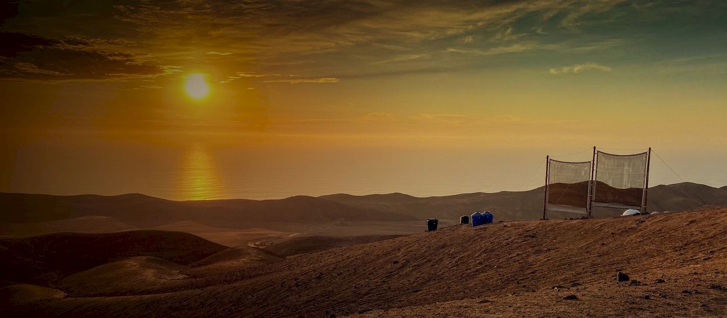 Mesh panels used to harvest water droplets from fog, an innovative solution for arid regions. (Photo: Nicole Saffie)